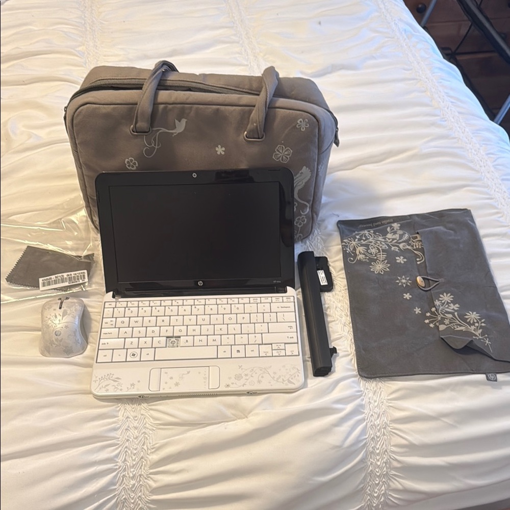HP Laptop with Accessories in Gray and White